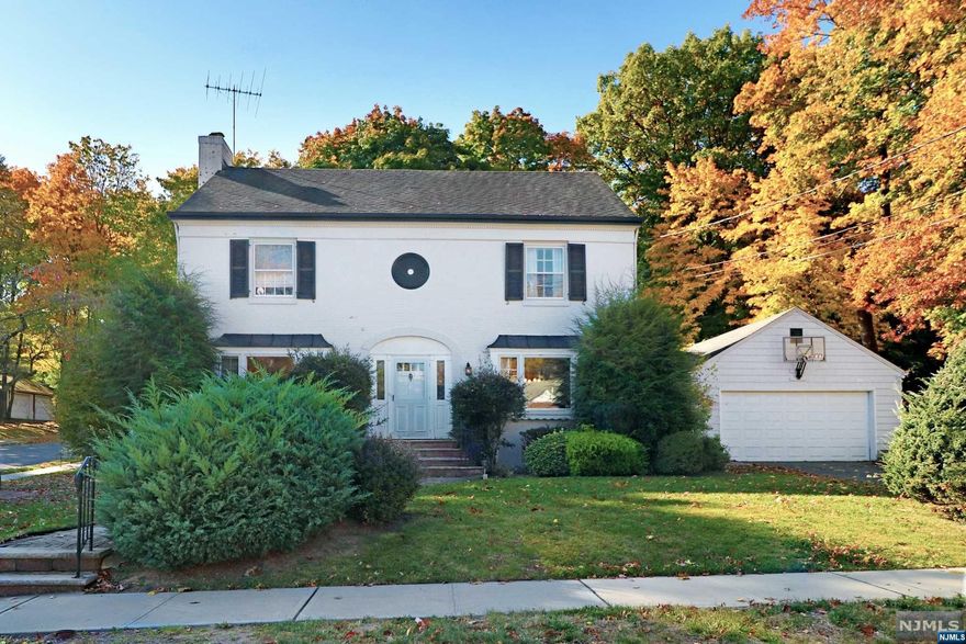 CURB APPEAL abounds at this STATELY CLASSIC CENTER HALL COLONIAL resting on .33 ACRES just STEPS TO VERONA PARK. Entertain all your guests in this Front to Back Living Room w Wood Burning Fireplace (Chimney and Flues as is no known issues) with Hardwood Floors Under Carpeting, Large Formal Dining Room, Newer Eat in Kitchen w Stainless Steel Appliances, Generous Pantry and Custom Bay Window Banquette overlooking the Stone Patio and gorgeous Backyard. Enormous FAMILY ROOM ADDITION, Powder Room and Sunny Breezeway to 2 Car Garage complete the Main Level. Upstairs the SECOND LEVEL features 3 LARGE BEDROOMS and a spacious main Bath with Tub, separate Shower Stall and two linen closets. BEDROOM 3 (currently configured as a huge walk-in closet/dressing room) boasts an ENSUITE BATH and ROOF DECK overlooking the PARK LIKE BACKYARD. WALK-UP THIRDLEVEL is home to BEDROOM 4 with ENSUITE BATHROOM and unfinished future BEDROOM 5. Unfinished LOWER LEVEL.