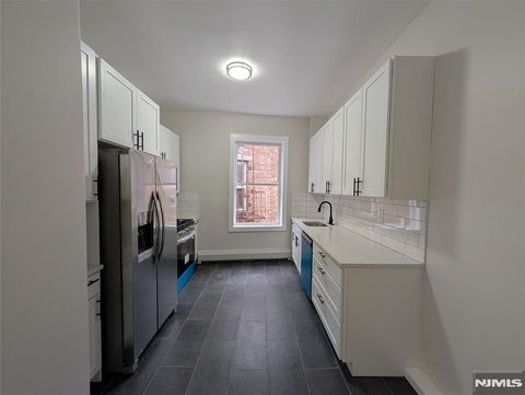 Photo of 69 Howe Ave #9, Passaic, NJ 07055 (MLS # 26008321)