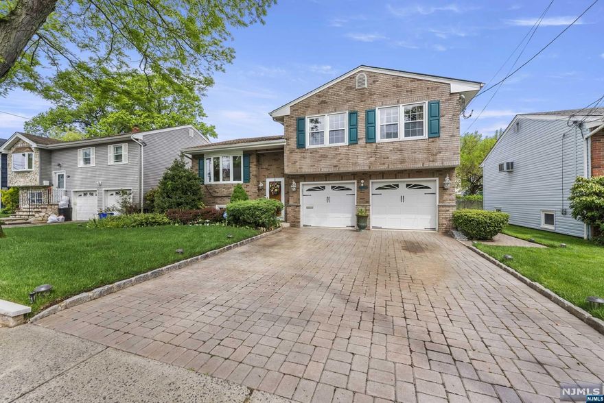 Welcome to 30 Gracel St, Bloomfield, NJ! This stunning meticulously maintained split-level home offers 3 bedrooms, 2 bathrooms. As you step inside, the foyer welcomes you with elegance, setting the tone for the entire property and you'll be greeted by the hardwood floors that flow throughout the home. The renovated kitchen boasts amenities and is complemented by a skylight that fills the space with natural light. The basement offers entertainment opportunities abound with a media/recreation room, ideal for movie nights or game days, while the wet bar adds an element of sophistication to the home. Outside, the backyard offers a private oasis with a barbecue area and a fence for added privacy. The convenience of a laundry room and central AC ensures comfort and practicality, while the security system and video security provide peace of mind. Located in a desirable Brookdale neighborhood. Don't miss the opportunity to make this exquisite property your own