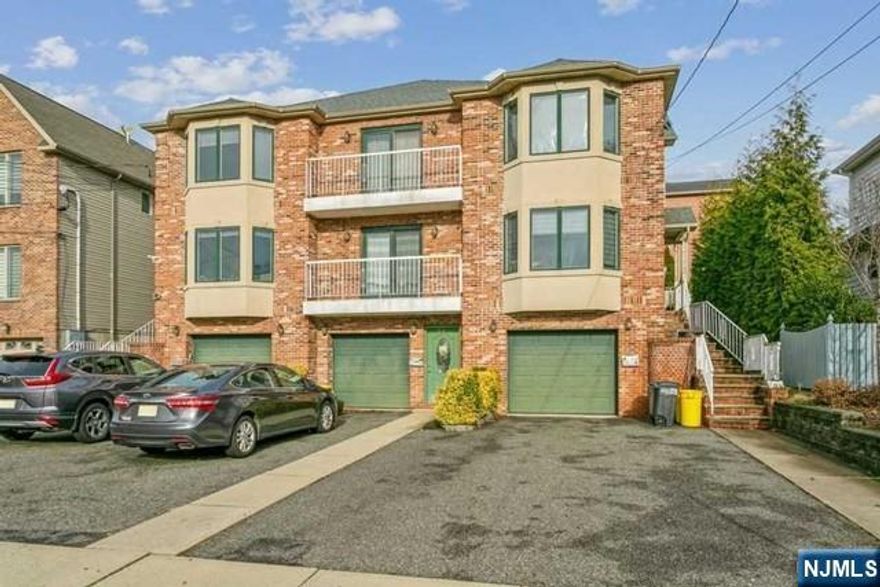 Spacious brick townhome offering generous living space across approximately 2,000 sq. ft., with two private balconies and a wooden deck off the living room â€” perfect for outdoor entertaining. As the largest of three units and centrally positioned, this home benefits from reduced utility costs through shared walls on both sides.Built in 2003, the thoughtfully designed layout features a ground-level family room, a modern eat-in kitchen with granite countertops, and beautiful hardwood floors throughout. Three heating zones and central air conditioning provide year-round comfort and efficient climate control. Ideally located with easy bus access for a convenient commute to New York City.3 bedrooms,3 full bathrooms.
