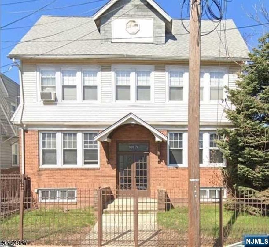 This multifamily home features 4 well-maintained apartments. Each unit has a comfortable bedroom, large living room and full kitchen. There is a bonus 3rd-floor unit, with a bedroom, living room, kitchen and full bathroom.