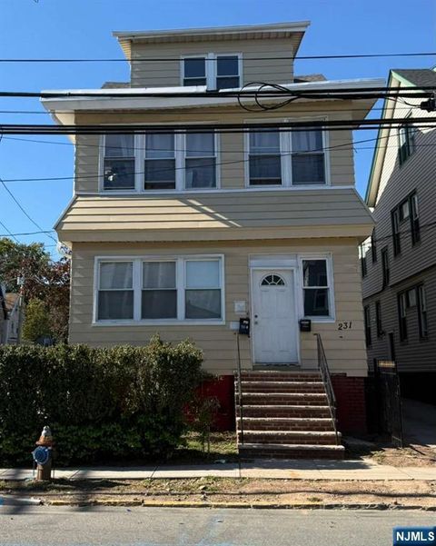 Photo of 231 Myrtle Avenue, Irvington, NJ 07111 (MLS # 25038810)