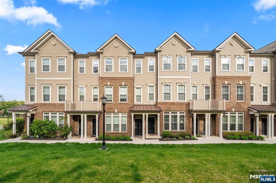 Welcome to LINK at Wesmont. The Bergen Countyâ€™s sought-after Wesmont Station communities. This 2022-built townhome ideal for easy living with NJ Transit steps away for NYC commutes. Choose from a fully upgraded 1,771 sq ft home with a bright open floor plan, modern kitchen, dining area, powder room, sun-filled living room with a balcony, master suite with walk-in closets, double vanity, and adjacent office space for work-from-home needs or can be easily converted 3rd Bedroom, plus bonus features like a smart doorbell, new fridge, and recessed lights. Or opt for a bright, turnkey 2-bed, 2-bath townhomeâ€”impeccably maintained with two levels, a gourmet kitchen (custom cabinets, granite counters, energy-efficient appliances), waterproof vinyl floors, oversized double-sink bath, full washer/dryer, and attached 1 car garage, driveway, guest spaces. All are minutes from shopping, gyms, and highways, blending suburban comfort with urban accessibility. Plus nearby parks, playgrounds, dog parks, and athletic fields.