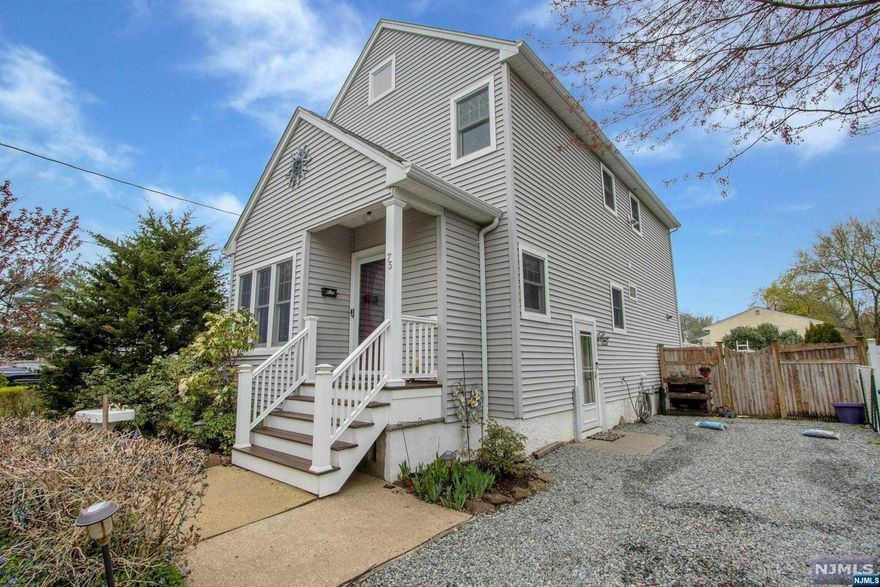 Lovely 3-BR Colonial, Rebuilt in 2007, offers a Beautiful Open Floor Plan with Gleaming Hardwood Floors and Custom Woodwork Throughout in Westwood! Welcoming entry with a bonus room featuring an ELFA closet system, perfect for an office or mudroom. The bright and open living room includes a sitting area. The open dining room features sliding doors to a charming screened-in composite wood porch. The exquisite kitchen, renovated in 2021, features a large center island, quartz countertops and a custom glass tile backsplash. An updated full bath including a jetted tub completes the first level. On the second level you will find a large bedroom featuring a wall-of-windows for natural light and a custom walk-in ELFA closet. Two spacious bedrooms and an updated full bath completes the second level. Lush, professionally landscaped property offers a large fenced-in backyard including a 12x28 above ground pool and paver patio, great for entertaining.