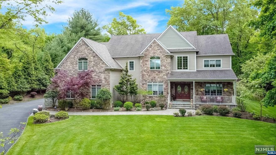 WELCOME TO THIS BEAUTIFULLY MAINTAINED 11 YEAR YOUNG CENTER HALL COLONIAL LOCATED IN A PARK LIKE SETTING ON ONE ACRE, IN THE FARDALE SECTION OF MAHWAH. CUSTOM BUILT HOME,WHICH BOASTS 5 BEDROOMS, AND 4.5 BATHS. THIS HOME ALSO FEATURES BEAUTIFULLY MANICURED PROPERTY, 3 CAR GARAGE,MATURED PLANTINGS. SOME OF AMENITIES INCLUDE: CENTRAL MUSIC SYSTEM THROUGHOUT HOME,BRIDGE OVERLOOKING GREAT ROOM, POURED CONCRETE FOUNDATION,WATER SOFTENER, TWO STAIRCASES, CENTRAL VACUUM,HARDWOOD FLOORS THROUGHOUT. A TRUE GEM OF A HOME! LOOK FORWARD TO SEEING YOU.