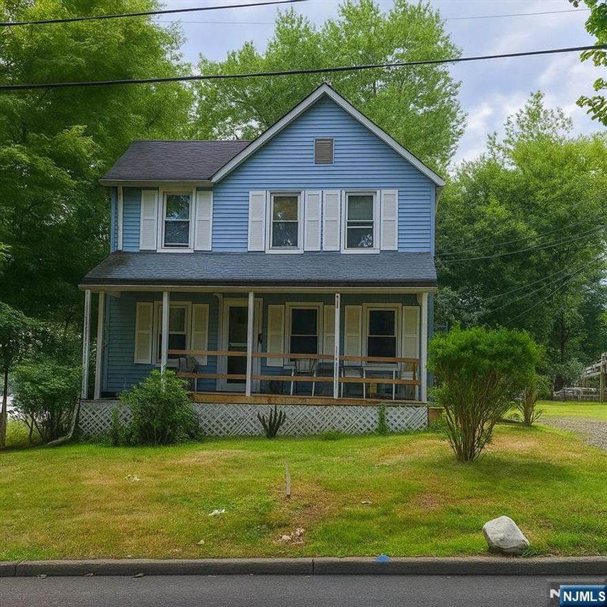 Colonial style home on a large 75 x 150 lot. First floor with living room, dining room, den, kitchen, full bath and front porch with ramp. Upstairs there's three bedrooms and a full Bath, Basement is full and unfinished. Home and large detached two car garage in need of a some TLC. Close to Park, School, House or Worship and shopping. Short walk to NYC transportation and local. Close ot all. Being sold "As Is". Possible short sale. Subject to third party approval Make an offer?
