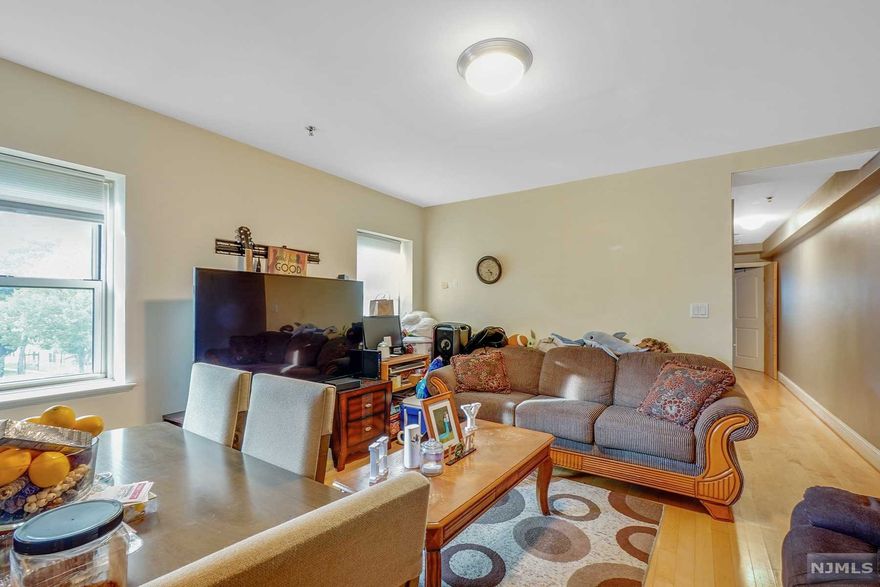 Your search finally a newly renovated two bedroom condo in East Orange ends here. This tastefully renovated two bedroom, one bathroom apartment offers over 800 square ft of living space. Kitchen features granite countertops and stainless steel appliances. The unit has washer/ dryer on site and hardwood floors throughout. This amenities building includes a recreation room and fitness center. Conveniently located condo building is surrounded by public transportation and all that East Orange has to offer. One garage parking space included. Come quick!