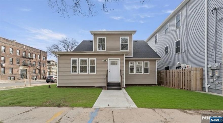 This beautifully built NEW CONSTRUCTION home in the heart of Newark's historic Weequahic District. Rebuilt from the foundation up, this modern residence offers peace of mind and quality craftsmanship throughout. Enjoy brand-new plumbing, new electrical systems, new roof, windows, and flooring every detail has been thoughtfully upgraded for today's lifestyle. This spacious home features 4 bedrooms and 2 full bathrooms, providing comfort and flexibility for any living arrangement. The main level flows seamlessly with bright natural light and modern finishes, while the outdoor deck extends your living space for relaxing or entertaining. A rare find in the area, the property includes a large 2-car garage, offering ample parking and storage. Conveniently located close to major highways, public transportation, schools, parks, and local shopping, this home provides easy access to NYC and all surrounding areas. Don't miss the opportunity to own a fully rebuilt, move-in-ready home in one of Newark's most historic neighborhoods!
