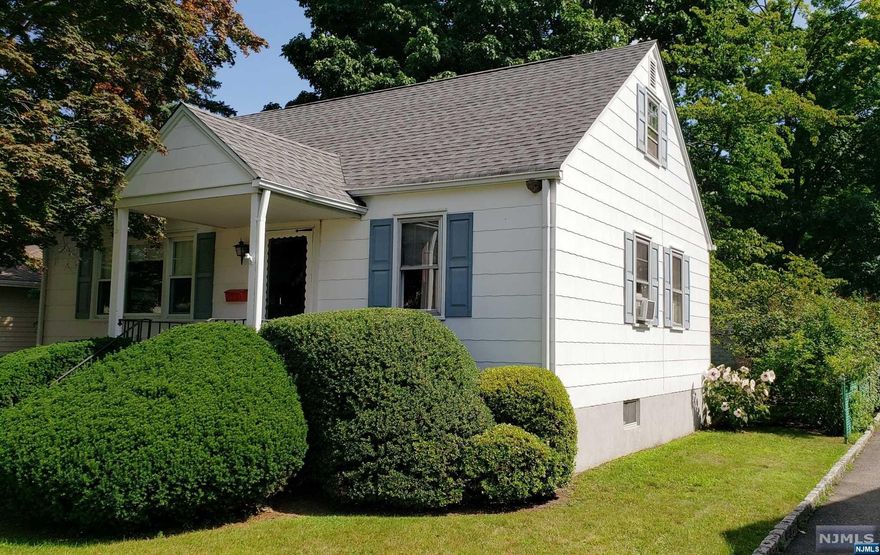 This classic 4-bedroom Cape Cod home is ready for you to move right in. The property is well-maintained, has an extra large detached garage, plenty of parking, a covered porch, a large shed (or play house), and a spacious backyard. There are hardwood floors in the Living Room, Hall and both Bedrooms on the First Floor. The home has been recently fully painted. The Eat-in Kitchen was nicely updated with nice cabinets and countertops. There is a door to the back porch and the backyard. There is a pantry and plenty of room for a table and chairs. The second floor has two nice-sized additional bedrooms. The full-size unfinished basement hosts the utilities, washer and dryer, and an area with plenty of room for a gym, or playroom. In the process of installing a new four-bedroom two-bathroom septic. Do not miss this opportunity to own a home in prestigious Pequannock, all close to shopping, worship, all major highways, and highly respected schools. This home is NOT in the Floodplain.