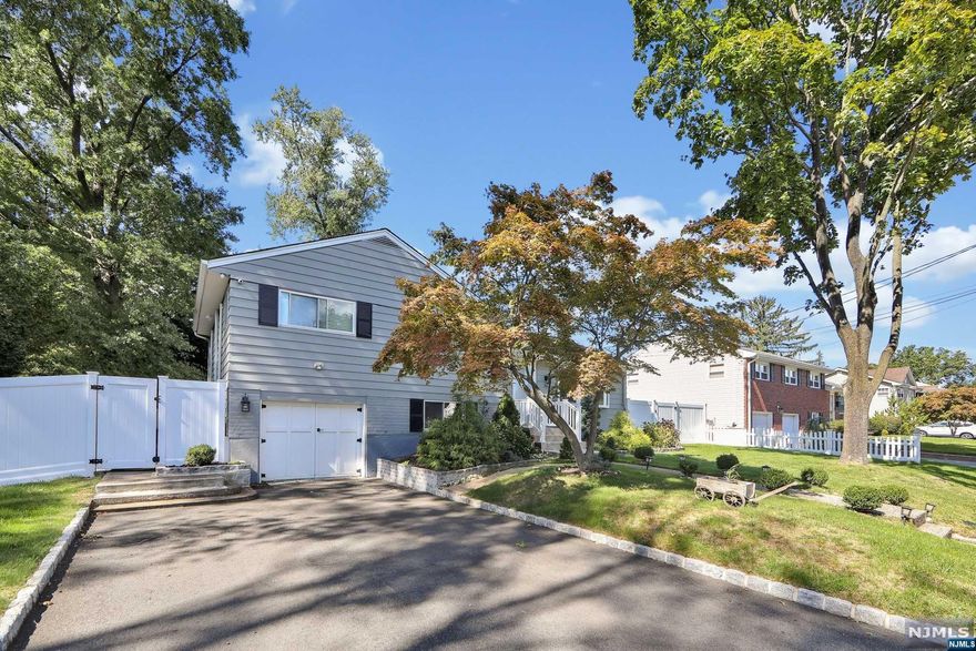 A wonderful home and great neighborhood are what come to mind with 4 Beacon Street. The home is in move-in condition waiting for a family to take advantage of highly rated schools in Dumont. You will be in a premier neighborhood in a sought-after section of town with easy access to transportation. The house offers 4 bedrooms and 2 1/2 baths and a large backyard for you to make it your entertainment oasis. This is the one you have been waiting for... come see it soon!