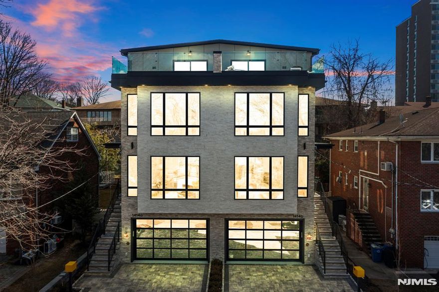 Experience luxury at 14th Street with this stunning 4-level, 4,400 sqft townhome. Designed for modern living, it features 4 bedrooms, an office/den, and 5 bathrooms. The main level offers 10-ft ceilings, built-in speakers, a chef's kitchen with a waterfall island, custom cabinetry, a natural stone fireplace, and a walk-out terrace. The primary suite boasts walk-in closets, west-facing views, and a spa-inspired bath with dual vanities and heated floors. The 9-foot rooftop level is an entertainer's dream, equipped with an extra Cat-6 internet line, a rec room, wet bar, rooftop terrace, office/den, an additional bedroom, and a full bath. Situated on a serene dead-end street, this home provides picturesque west-facing views and is located in the highly sought-after School One District. Enjoy the convenience of being walking distance to Fort Lee Middle School, Community Center, H-Mart, and having easy access to New York City. This property epitomizes the pinnacle of luxury living.
