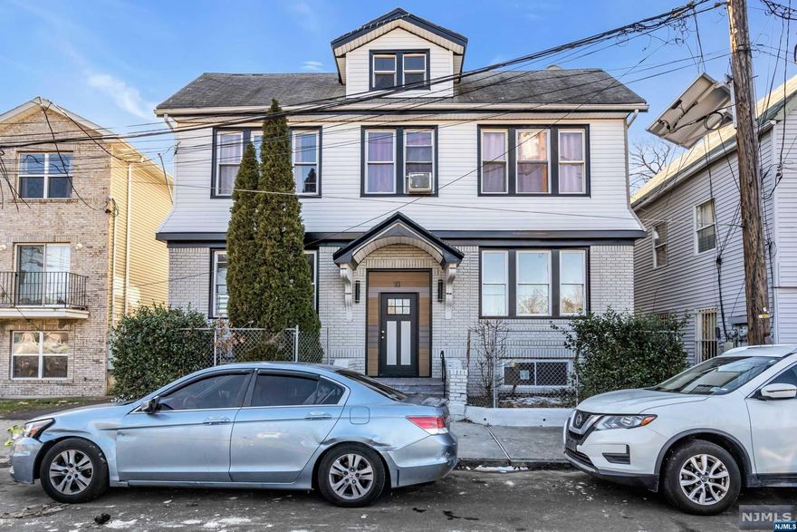 Discover an Exceptional Opportunity in Newark, NJ! This newly renovated 4-family home at 8-10 Edmonds Pl. is a hidden gem! The common areas and siding have been completely transformed, exuding fresh elegance. Meticulously revamped 1st-floor units offer a modern and inviting ambiance. Unit 2, currently vacant, boasts 3 beds and 2 baths, showcasing a brand-new kitchen with sleek stainless steel appliances and dazzling tiled bathrooms. It's move-in ready, ideal for homeowners craving a contemporary haven or investors eyeing a multi-family dream. Don't miss the chance to unlock additional income potential! Unit 1, a 2-bed, 1-bath, is leased at $800/month on a flexible month-to-month agreement. Unit 3, a stunning 2-bed, 1-bath, is leased at $1725 until January 2024. Meanwhile, Unit 4 is rented at $1560, with the lease ending on 3/31/24. Parking is hassle-free with space for 6 cars at the back, ensuring convenience for residents and visitors.