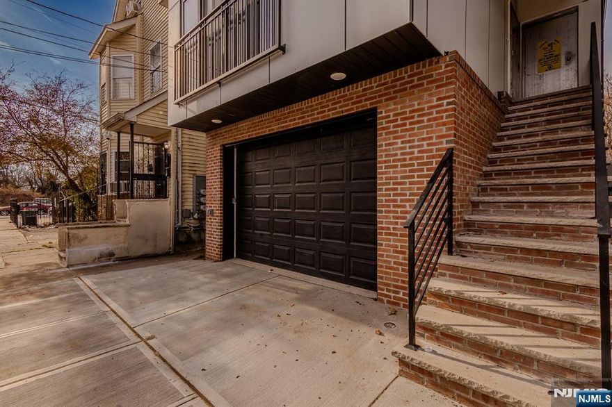Brand new construction, 2 units consisting of 3 bedrooms, 2 bathrooms each floor. Stainless steel appliances, central air and heat, hardwood floors throughout, built-in garage, near public transportation, shopping, and much more. 10-year builder's home warranty. 5-year Tax abatement