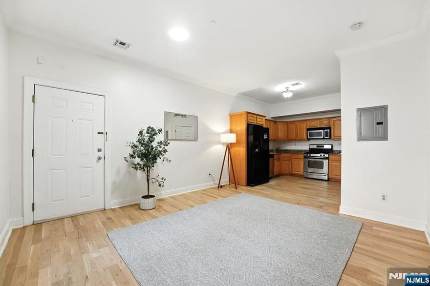 Donâ€™t miss your chance to own a well-appointed 1-bedroom, 1-bathroom condo in one of Jersey Cityâ€™s fastest growing neighborhoodsâ€”Journal Square. Ideally situated just a few blocks from the JSQ PATH station, this first-floor unit offers unbeatable convenience with both an assigned parking space and private storage, rare finds in the area! Nestled in a quiet, well-maintained building, the home features a freshly painted interior with an open-concept kitchen and living area, perfect for entertaining or unwinding after a long day. The spacious bedroom offers generous closet space, and the washer/dryer on every floorâ€”just steps from your unitâ€”adds ease to your daily routine. Commuters will appreciate seamless access to the PATH, major highways, and local bus lines, while first-time buyers and investors alike will recognize the value of this move-in-ready gem. Surrounded by shops, parks, restaurants, and transit options, this is a prime opportunity to own in one of Jersey City's most accessible and dynamic neighborhoods.