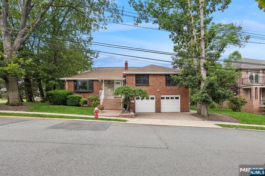 Don't Miss this beautiful well maintained single family Home, nestled in the sough after South Bluff Section of Fort Lee. This home's first floor boast a living room, a very large dining room perfect for large gatherings, a remodeled kitchen with an island and a guest powder room. In the second level you find a large Master Bedroom with access to a remodeled J&J master bath; two additional bedrooms and access to a very large attic with lots of possibilities. In the lower level there is a large room with ground access, a family room, laundry and lots of storage. The home also features a two car garage, and a beautifully paved driveway and patio perfect for barbecues. Close to two bus lines to NYC, Highways, houses of worship, schools, parks and a short distance to the bustling down town area, filled with shopping and restaurants.