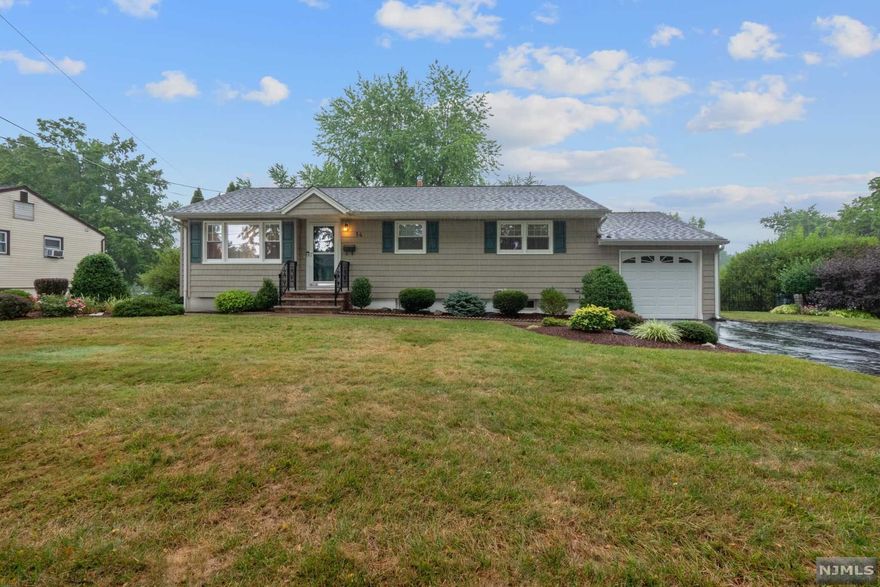 Welcome home to this pristine three-bedroom ranch perched on a beautiful third of an acre lot in desirable Wayne New Jersey! Pull up to this home and you immediately see the love and care that's gone into maintaining the property. Enter the front door and you're greeted with a warm bright feeling generated from the big picture window that helps you see directly through the house into the gorgeous backyard. Enjoy an updated kitchen, beautiful hardwood floors, and three spacious bedrooms. A finished walkout basement with another full bath offers direct access to a park-like private backyard. Add in a whole house generator, beautiful cedar shake impressions vinyl siding, and awesome sellers who took really good care of this wonderful home, and this home is just perfect. Bring your bags and move right in-