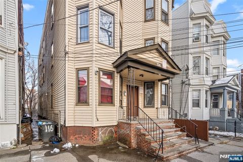 Photo of 114 Neptune Avenue, Jersey City, NJ 07305 (MLS # 25044208)