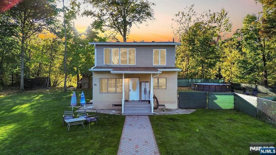 Welcome to 41 Fayette Ave, a stunning four-bedroom, three-bathroom home that has been fully renovated to perfection, nestled in the heart of Wayne, New Jersey. This property offers an ideal blend of modern luxury and spacious living, perfect for families and entertainers alike. As you enter, you'll be greeted by an open-concept layout filled with natural light and elegant finishes. The gourmet kitchen features high-end appliances and quartz countertops, making it a chef's dream. The living and dining areas flow seamlessly, perfect for hosting gatherings or enjoying quiet evenings at home. Don't miss the opportunity to make this exceptional property your own WITH LOW TAXES!