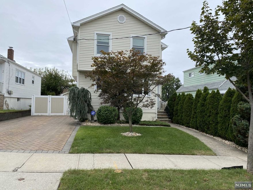 WELCOME TO THIS RENOVATED 4 BEDROOM,3.5 BATH COLONIAL LOCATED IN A NICE RESIDENTIAL NEIGHBOR CLOSE TO GRAMMAR SCHOOL. 1ST FLR OFFERS MEIK,DINING RM,HUGE FAMILY RM WITH WOODBURNING FIREPLACE LEADING ONTO LG DECK. 2ND FLR OFFERS MASTER BEDRM WITH MASTERBATH AND WIC,THREE ADDITIONAL BEDRMS WITH PLENTY OF CLOSET SPACE,FBTH AND WASHER DRYER HOOKUPS. BASEMENT IS FULL FINISHED WITH HBATH,LAUNDRY RM AND UTILITY RM. LONG EXTENDED PAVER DRIVEWAY PARKING FOR 4+CARS WITH DETACHED OVER SIZE HEATED 1 CAR GARAGE. C/A,HARDWOOD FLRS ON 1ST FLR, NEW WATER HEATERAND FENCED IN YARD. CONVENIENTLY LOCATED NEAR TRANSPORTATION,SHOPPING AND SCHOOLS. BEING SOLD IN AS IS CONDITION.