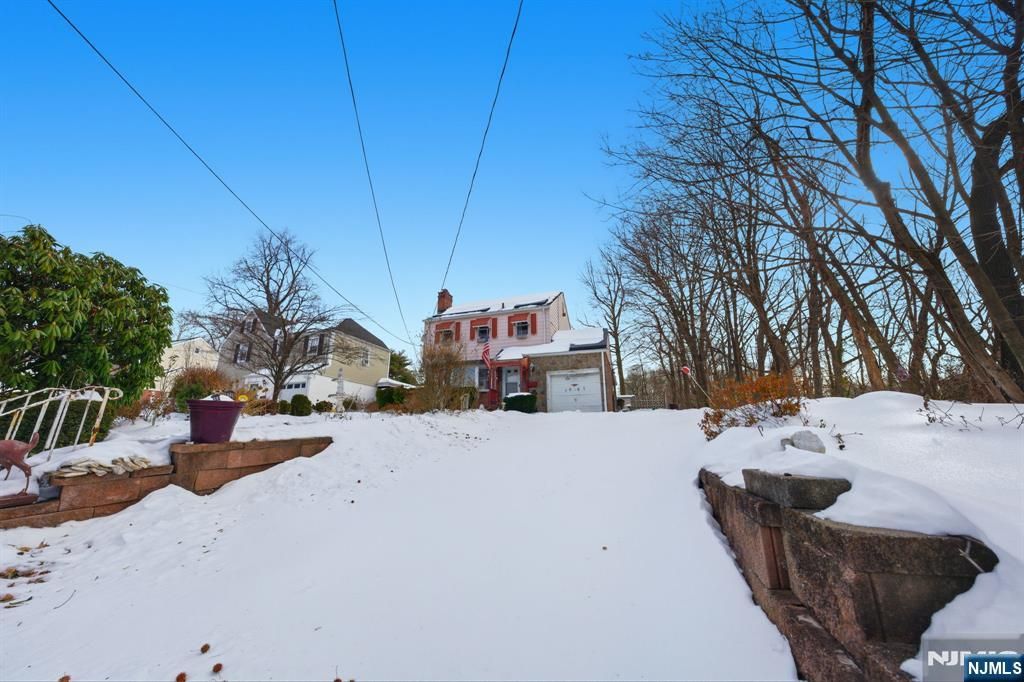 Photo of 1067 Julia Street, Teaneck, NJ 07666 (MLS # 26004215)