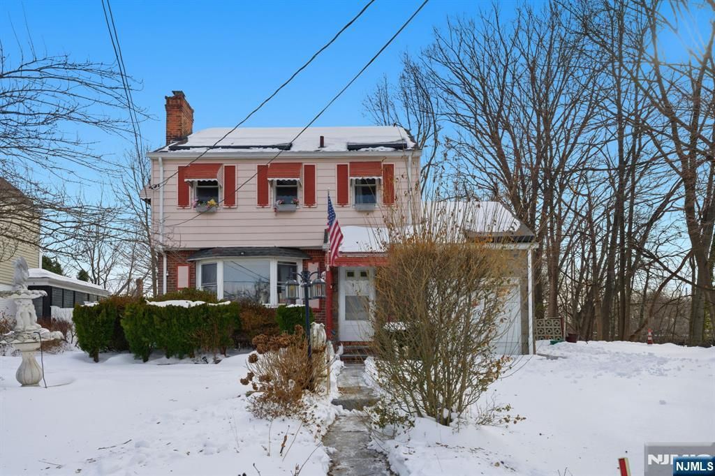 Photo of 1067 Julia Street, Teaneck, NJ 07666 (MLS # 26004215)