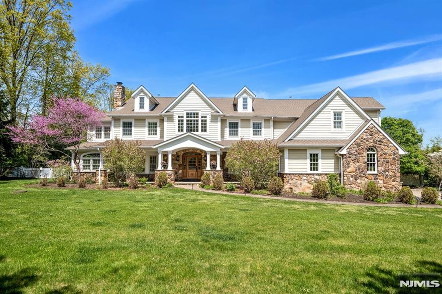 Stunning dream residence defines curb appeal and offers everything you've been searching for, with 5 bedrooms and 5.5 bathrooms in ultra-desirable Upper Saddle River, sitting on over an acre of meticulously manicured grounds. Boasting approx 6,800 sq ft across the main 2 levels, plus an additional 3,300 square feet in the unfinished lower level, a blank canvas for future finishing. This home combines timeless design, luxurious amenities, & exceptional spaces. Warm and welcoming 2 story foyer sets the tone, opening to expansive rooms. Quality features and finishes throughout. Gorgeous kitchen with quality cabinetry, professional SS appliances, and huge center island. 2 story great room with FP. Serene backyard retreat with ample space for a future pool. Inside, all 5 bedrooms include en-suite baths & excellent closet space, including a 1st floor guest suite, ideal for multi-generational living. The primary suite is a true sanctuary, complete with a sitting room, vanity area, & 2 large WICs. 2nd floor bonus room, front and rear staircases, 3 car garage, and more. Absolutely spectacular home.