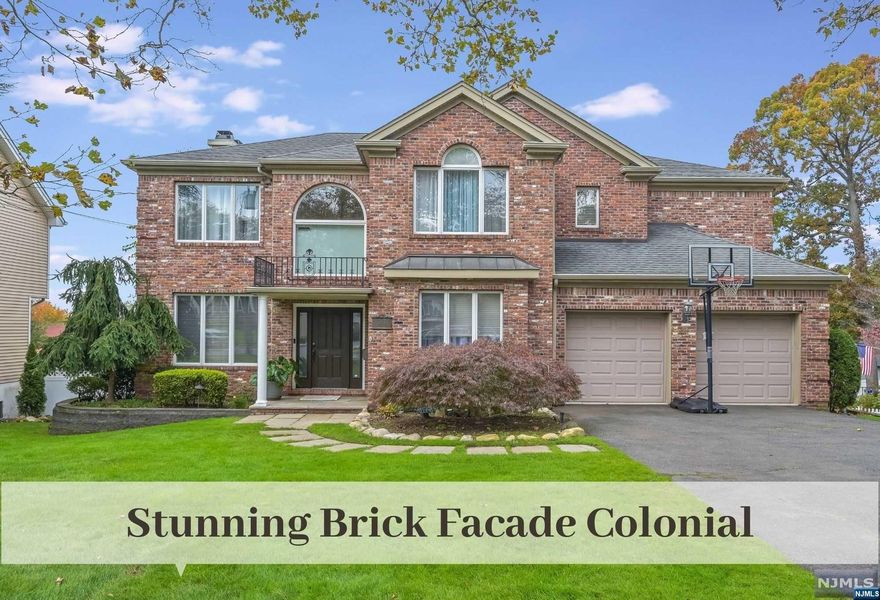 Stunning Brick Facade Colonial with Impressive 2-Story Entrance and Striking Architectural Features is nestled in quiet & inviting neighborhood yet just moments to Schools, Playgrounds, Athletic Fields, Shopping & NYC Transport. Pride Of Ownership is evident at every turn in the Beautiful Updates, Elegant Materials & Superior Craftsmanship. Living Rm & Dining Rm flank Central Staircase leading to outstanding Open Concept Living including new State-of-the-Art Kitchen, Great Room w Frplc & Casual Dining w Deck Access.. Nearby is 1st Fl Bedrm w EnSuite Bath. Ascend to 2nd Fl to find Expansive Sunlit Landing, Prim Bedrm w WIC & EnSuite, 3 Bedrms, updated Hall Bath & Laundry. Lower Level with lrg Rec Rm [30X15] has Kitchenette for Convenient Poolside Hosting, 6th Bedrm or Gym & bright new Full Bath. 2 Car oversized Garage. NJ Transit # 758 just 2 blocks away. The Backyard Oasis is just in time for your Summer Enjoyment.