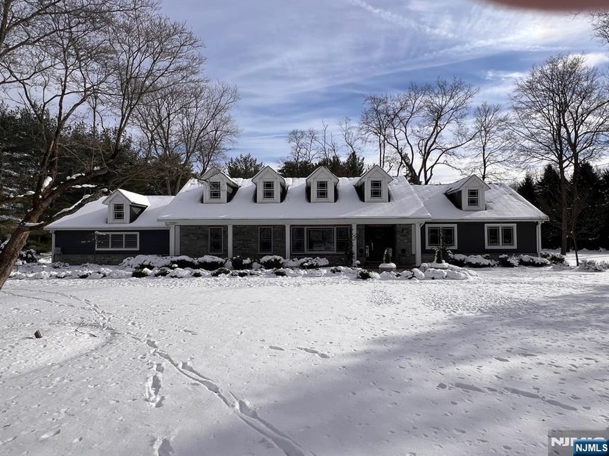 Fabulous Urban Farms Mill Gate location set on 1.2 acres. This approximately 3,200 sq ft home was fully gutted, renovated, and expanded in 2010. Features include 10-foot ceilings in the entry foyer, living room, dining room, and family room. The primary suite offers a 13-foot tray ceiling, a spacious primary bath, and a walk-in closet. The kitchen and all bathrooms are appointed with high-end appliances and premium fixtures. Designed for one-floor living with garage access and laundry conveniently located on the main level. Additional highlights include a 748 sq ft covered patio, a 203 sq ft covered porch, a whole-house generator, and professionally designed outdoor living spaces. The property has been thoughtfully upgraded with a covered patio, a new septic system installed in 2017, extensive landscaping with mature privacy trees, bluestone walkways at the front and rear of the home, and substantial interior improvements including updated trim, doors, bathrooms, refinished floors, a reverse osmosis system, a renovated kitchen, and updated ductwork and HVAC furnaces.