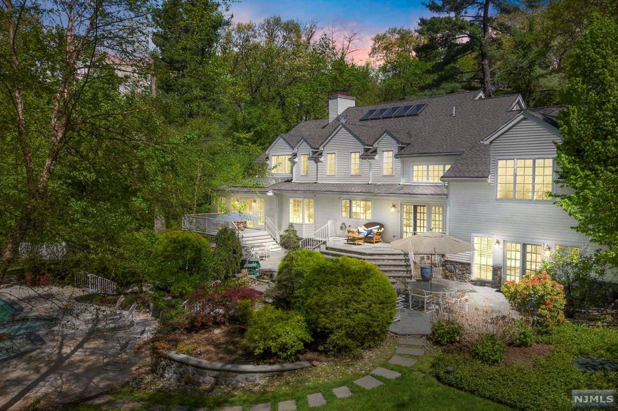 Amazing 5 acre private oasis, perfect for entertaining and less than 30 minutes from Manhattan. A private road brings you to this custom home, with plenty of space for both work and play. Picturesque views of this beautiful property from each window. Gourmet kitchen, living room, great room and office all with fireplaces, finished basement, in-ground pool w/waterfall/spa, outdoor kitchenette, detached garage. The VIRTUAL TOUR link for this listing contains an enormous amount of relevant information including a comprehensive video tour with hidden features & room dimensions, written description, additional photos, floor plans, and a complete interactive 3D model of the home.