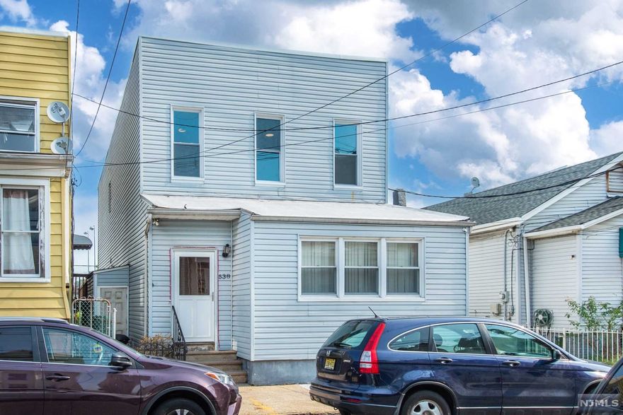 Immaculate move in ready 2 family home with driveway for 2 cars & 1 car garage located 1 short block from Bergenline Ave shopping , NYC trans, municipal parking lot & near schools . Owner Occupied. Each unit offers Living room, spacious eat in kitchen , 3 bedrooms and full bath. Completely renovated beautiful basement with family room, home office, laundry room, storage and 1.5 renovated baths. Walk out to private yard with patio and garage from basement or 1st floor unit. Unit one features bonus room being used as home office. Miller Park is located behind house and near Robert Mendez Grammar School. House will be delivered vacant at closing . Sold as is . No know defects.