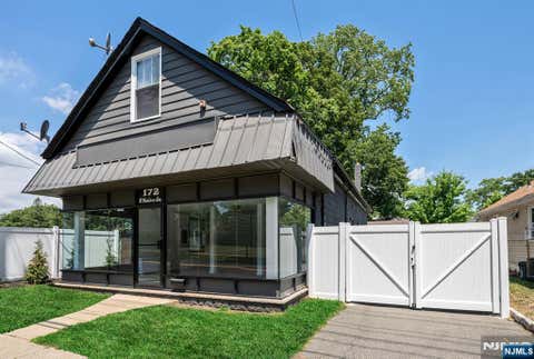 Photo of 172 W Madison Avenue #Storefront & Ga, Dumont, NJ 07628 (MLS # 26021901)