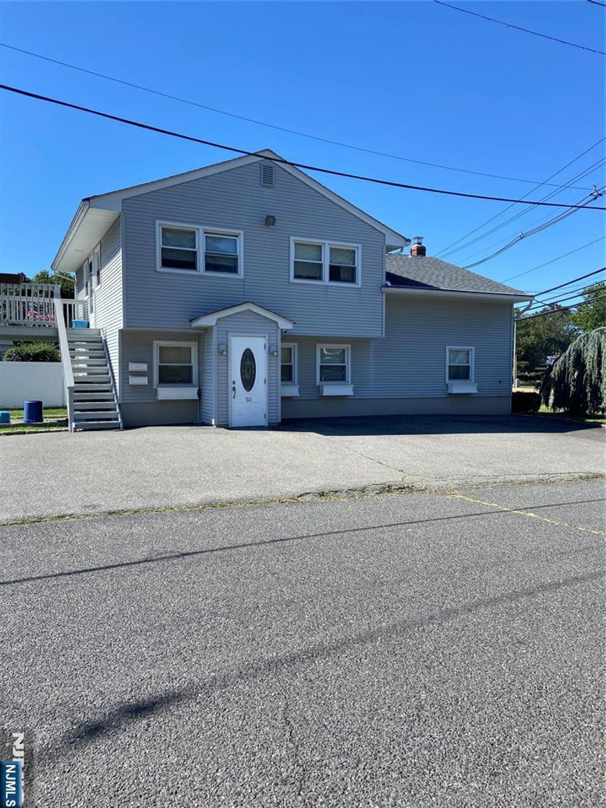 Great location!! This office is fresh and ready to go. There are 3 rooms each with a sink and cabinets, a powder room, a separate office, large reception area for 2 people and a large comfortable waiting room. There is an additional room that was used for x-rays but can be a 4th room (no sink) or office. Hook-ups are provided for a stackable washer & dryer. Perfect for the business owner requiring a sink in the room. Additional storage in the basement. Utilities are not included. Parking off street for patients'/customers' cars with direct access to the office. No stairs! A wonderful set-up!