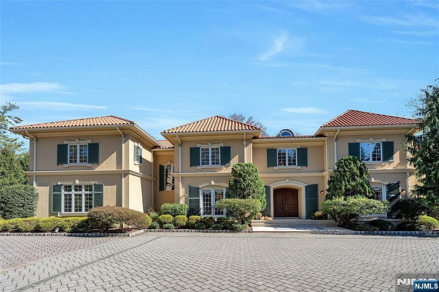 Set on a scenic 2-acre corner lot in Saddle Riverâ€™s newest subdivision, this luxurious 7000+ square foot, 5-bedroom, 6.5-bath villa showcases soaring ceilings and expansive walls of glass that frame beautifully landscaped grounds. Enjoy four fireplaces, an inground pool, spa, and a stunning studio guesthouse/cabana complete with a large entertaining area with fireplace, gym, kitchen, bathroom, laundry, and fireplace. The home features a dramatic great room, an oversized primary suite, a 4-car garage, and countless high-end details throughout.