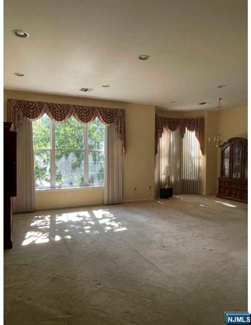 Welcome to Four Seasons at Wayne 55+ Active Adult Community! Ideal End Unit is Spacious and Features Oversized Living Room & Dining Room , High Ceilings, Modern Eat In Kitchen with Appliances, Sliders to Terrace, Master Bedroom with Master Bath, Walk In Closets, Laundry Rm w/Washer & Dryer, Indoor Parking Garage w/Elevator to First Floor, Storage Room & Shared Storage Closet in Hallway. Community offers including Clubhouse, pool, tennis, billiards, fitness center. Close to shopping, restaurants, and major transportation.