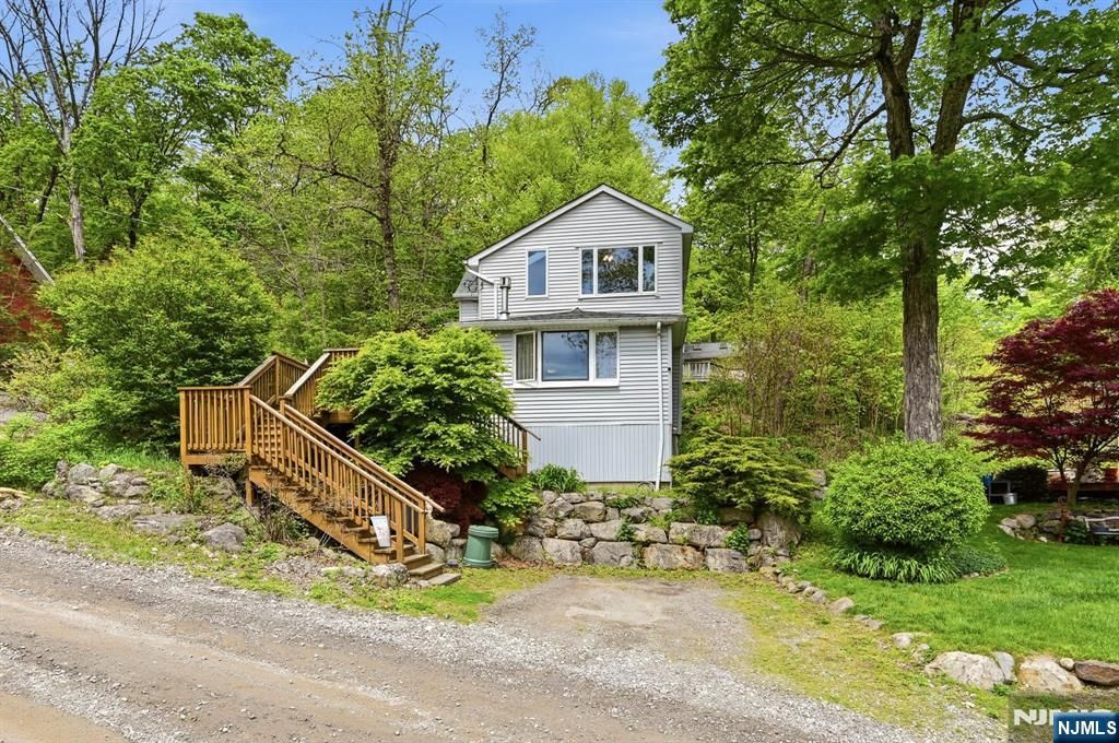 Photo of 48 Goldfinch Lane, West Milford, NJ 07421 (MLS # 26018182)