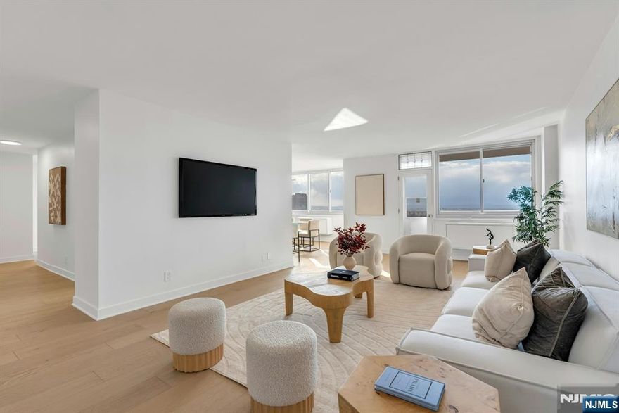 You rarely see something so perfect. 2 bed/2.5 bath co-op iis completely renovated and just finished. Hardwood floors, new closet doors, renovated kitchen with stainless appliances, new bathrooms, freshly painted, new HVAC units. Western exposure provides the most gorgeous sun-filled afternoons and breathtaking sunsets. Terrace overlooks local parks, foliage and mountains. Three hall closets. Primary suite is x-large with an en-suite bath incl. double-sinks stall shower, walk-in closet, 2nd closet and changing area. Smooth ceilings w/o popcorn. The Regency is a luxury building with a 24-hour doorman, indoor parking (1 spot guaranteed for $70/month), laundry on every floor, rooftop pool, exercise room, community room, renovated hallways and elevators and one pet allowed under 25 lbs. (dogs welcome!). One block the NYC/NJ buses. Close to schools, parks, shopping, restaurants, houses of worship. Maint incl all utilities.