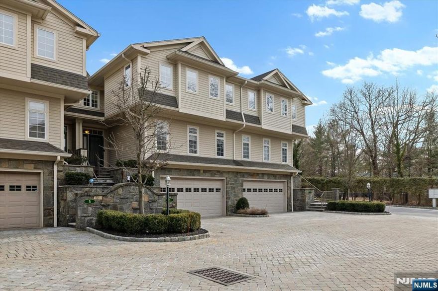 HIGHEST AND BEST DUE BY FRIDAY AT 11:00 AM. Welcome to this luxurious townhome in the highly coveted Victoria Square located on the East Hill of Tenafly, 4 bdrms/3 Full Baths (3,300+/-SQ FT). Elevator access to all 3 levels. The expansive open floor plan encompasses a-state-of-the-art kitchen w/granite counter tops & peninsula w/bar seating which flows into the LR w/ gas fireplace. French doors open up onto a patio & backyard. A formal DR w/ crown molding, a spacious FR/BDRM w/ full bath complete this level. Recently refinished hardwood floors & tile floors throughout, as well as recessed lighting on all three levels. 2nd level 3 bdrms: a stunning primary suite w/sitting area, built-in window seat, dressing area & 2 spacious walk-in closets, and Lg bathroom w/jacuzzi tub. 2 bedrooms, lg bathroom, laundry, and 2 large linen closets. Ground floor w/ recreation rm, lg storage area w/cedar closet. 2 car garage. Home Water Filtration System. Close to NYC and public transportation.
