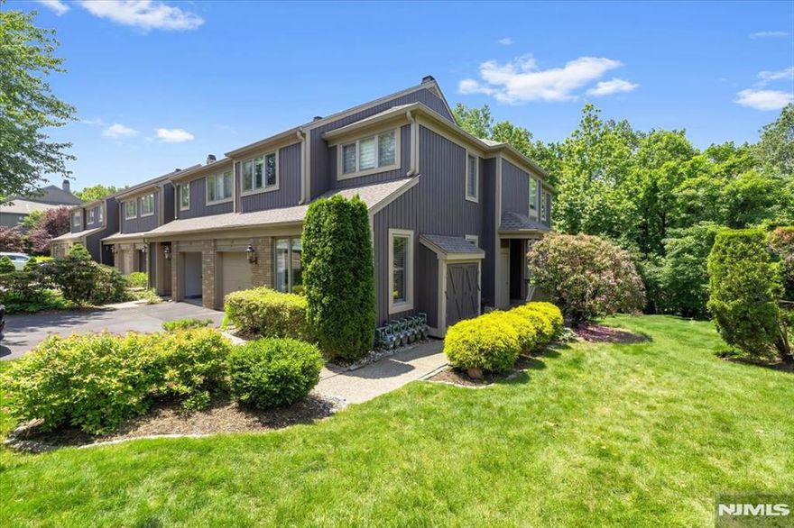 Welcome to sought-after Ramapo Ridge, thereâ€™s not much to do here but unpack! The main level of this beautiful end-unit townhome offers high ceilings, details such as crown molding and lots of sunlight! Upon entering you'll find a spacious foyer, living room and dining room and powder room. The kitchen opens to both a breakfast room and access to the deck. The second level features a primary suite with a full bath, 2 WICs, and a sitting area (that can easily be converted into a 4th bedroom) plus 2 bedrooms and a hallway full bath. On the lower level, there is even more living space - an expansive family room with a gas fireplace, an office/guest room, laundry room and a full bath with steam shower! Residents in Rampao Ridge enjoy access to the exceptional recreation center, offering a pool, fitness center, tennis and pickleball courtsâ€”all just minutes from top-rated schools, shopping, parks, and more. Donâ€™t miss your opportunity to live here!