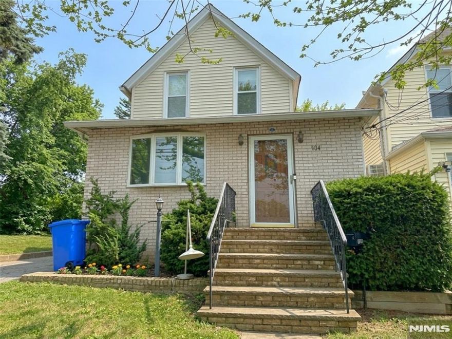 Located in Clifton's desirable Delawanna neighborhood, this well-maintained 3-bedroom, 2-bath Colonial offers charm, comfort, and convenience. Right across from Lowry Park, this home is located between shopping centers, restaurants, movie theaters, public transportation, and major highways. It's an excellent location for commuters and everyday living. Inside, a welcoming foyer leads to a bright and inviting living room filled with natural light. The kitchen and dining area flow together seamlessly, and easy access to the backyard ideal for both daily living and entertaining. There is also 1 bedroom on the first floor. Upstairs offers 2 comfortable bedrooms with ample closet space and a full bathroom. The freshly painted basement includes laundry and a covered walkout to the backyard, adding extra functionality. Outside, enjoy a well-kept lawn and garden, along with a spacious driveway that can fit up to 6 cars and an oversized detached garage, providing plenty of storage. A warm and inviting home ready for its next owner.