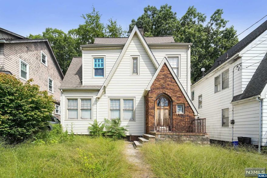 Welcome to 51 Woodbine Ave, a Wonderful Investment Opportunity! This charming fixer-upper presents a fantastic chance for those seeking a promising investment in a quiet neighborhood. With 3 bedrooms, 1 full bath, a basement, and an attic, this property offers ample space and potential for customization. Step inside to discover the possibilities that await. The spacious layout provides a blank canvas for your creative vision, allowing you to transform this home into your dream space. Add your personal touch to create a cozy atmosphere that suits your unique style. Property also has a screened in porch and outdoor deck. Located in a peaceful neighborhood, this property is ideally situated close to schools, parks, shopping, and trains. With its desirable location and potential for growth, 51 Woodbine Ave is a smart investment choice. Contact us today to schedule a showing and explore the endless possibilities this property has to offer!