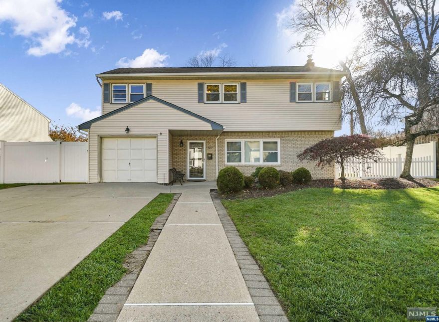 Welcome to an amazing opportunity in the White Beeches section of Dumont.This stunning 3 BR, 1.5 bath home is impeccably renovated & beautifully maintained. As you enter, you are greeted by the EF w/a coat closet leading to a bright FR w/a powder rm & lndry/util rm. The heart of this home lies in the sundrenched LR, boasting high vaulted ceilings, lrg windows & access to the BKYD.The LR seamlessly transitions into the updated EIK ft SS appl, quartz counters & a sunny breakfast area opening to the expansive deck. The lrg DR w/lrg bay window incl storage bench is an entertainer's dream. 2nd floor fts the primary BR, along w/2 generously sized BRs, all w/lrg closets for ample storage. A full bath completes this level.The stunning BKYD boasts an oversized deck & lrg grass area, creating a private retreat for r&r.Perfectly located around the corner from Seltzer School & close to parks, shopping, restaurants.W/close proximity to NYC, experience urban convenience in a suburban setting!