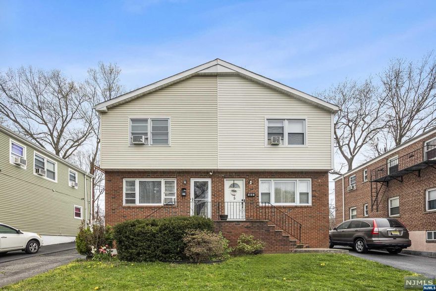 A stunning duplex home that offers open and spacious living. This beautifully designed residence and perfect a modern and comfortable space to call home. On the main level, you'll find an open-concept living area that seamlessly blends the kitchen, dining, and living spaces. The kitchen features high-end appliances, ample storage, and a large island for meal preparation and entertaining. The dining area is spacious enough for hosting family gatherings. half bath/ The living area is bright and airy, with large windows that allow for plenty of natural light. Upstairs, you'll find the private quarters of the home. The master bedroom is a true retreat. The additional bedrooms are generously sized and offer plenty of space for relaxation or study. A shared bathroom complete the upper level. a private backyard, perfect for outdoor activities and entertaining. convenient parking finished basement.Contact us today for more information or to schedule a viewing.