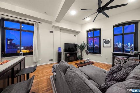 Photo of 518 Gregory Avenue #C402, Weehawken, NJ 07086 (MLS # 25032817)