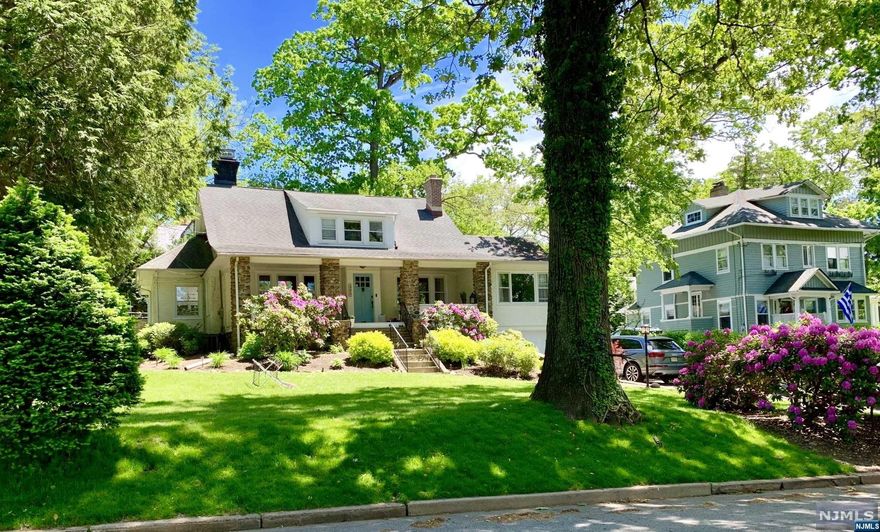 Located in Ridgewood's most desired part of the Wastena Park section, this newly renovated Craftsman home offers 4 Beds/2.5 Baths & old-world charm w/updated modern conveniences. Situated along a tree-lined street, you will be greeted by the charming oversized covered porch w/pristine landscaping all around. Enter into this beautifully preserved home to the open family & living room w/2 fireplaces. Enter the sun-drenched, completely renovated, state-of-the-art kitchen w/a large center island open to the dining room w/direct access to the 2-level deck w/a firepit & views of the backyard. The 1st floor level, you will also find the primary ensuite, i/c a walk-in closet & a modern bath w/double vanities & soaking tub. Completing the main floor is a 2nd bed, mudroom, & a half bath. Take the grand staircase to the 2nd level featuring 2 bed, a lounge area, a full bath, & a cozy play cave. Enjoy the semi-finished basement for your storage needs, W/D, private driveway, & attached garage.