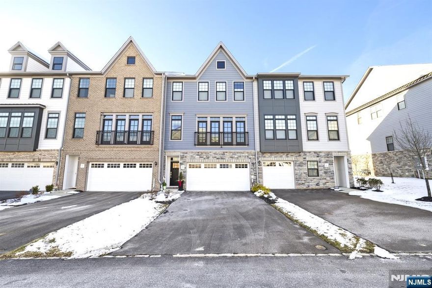 Now's your chance to own this incredible TH at "Village Springs at Montvale": a newer high end development built by 'Toll Brothers' that sold out fast. This is the "Briercliff" model, that was painstakingly selected by the current owner for it's practical floor plan. The home boasts 9'11" high ceilings, wide plank floors, + a bonus office on the mail level, & comes w/a dumbwaiter servicing all 3 levels. The home has east & west exposure for sunsets on the secluded back decks, and great natural light inside. Enjoy grilling, outdoor dining, & relaxing w/total privacy on two levels, w/a wooded hill in back. This unit has a larger floor plan allowing a full bathroom on the LL, a full laundry room w/sink (vs laundry closet), & the bonus office. Enjoy a welcoming large LR w/FPL + many upgrades, from "Smith & Noble" custom blinds in entire house (electric on main & LL), to an enormous walk-in closet that was impeccably built w/lots of racks and, fancy dressers. Many surprises await.