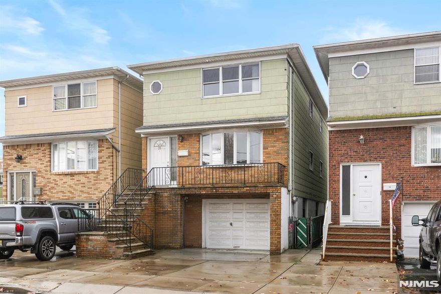 **OH Sat 12/06 @ 12pm-2pm** Welcome to this exceptional two-family home, ideally located just an 8-minute walk from the Harrison PATH station. This property offers 6 bedrooms, 2 bathrooms, and a wealth of modern updates, making it the perfect investment opportunity or multi-generational living space. The home features 3 separate electric panels for efficiency and convenience, as well as 2 sets of washer and dryer units on the ground floor, ensuring that everyday chores are a breeze. A new HVAC system provides year-round comfort, while the 12-year-old roof ensures lasting peace of mind. Both kitchens and bathrooms have been beautifully renovated, showcasing stylish finishes and modern appliances. The entire house has been thoughtfully updated with protective flooring, preserving the existing hardwood floors beneath. The property also includes 4 off-street parking spaces, providing ample room for both units' residents and guests. Currently vacant and move-in ready, this two-family home presents a rare opportunity to own a meticulously maintained property in a prime location. Don't miss your chance to see it in person - schedule a showing today!