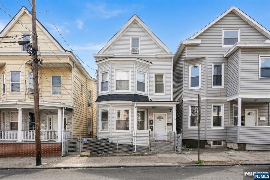 Welcome to this well-maintained two-family home in the heart of Paterson featuring a total of 8 bedrooms across two spacious units. The first-floor unit offers 3 bedrooms and 1 full bathroom, while the second-floor unit features 5 bedrooms and 2 full bathrooms, providing ample space and flexibility. Each unit offers bright living areas, large bedrooms, and eat-in kitchens with plenty of cabinet space. Enjoy a versatile layout with tiled flooring, updated bathrooms, and abundant natural light throughout. The property also includes a private backyard, perfect for relaxing or entertaining.Ideal for both investors and owner-occupants, this home offers great income potential and flexibility. Located in Paterson, known for its rich history, vibrant community, and convenient access to NYC, shopping, dining, and major highways. On-street parking available. Don't miss this excellent opportunity to own a spacious multi-family property in a prime Paterson location.