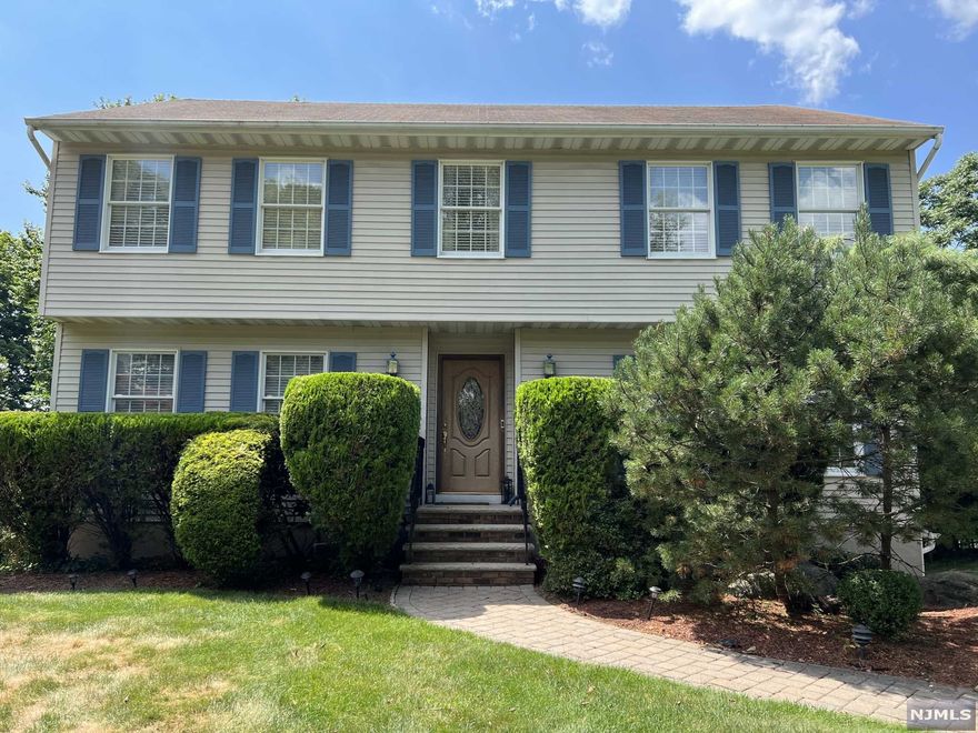 Lovely home located in one of Mahwahs beautiful Cragmere neighborhoods. Nestled on a nicely landscaped property with an inground sprinkler system. Sit on the deck under the new Sunsetter awning with its remote control. This welcoming home offers a first floor flow of spacious rooms, kitchen with sliders to deck, lots of light and a family room with fireplace. The second floor features a large primary suite in addition to the three additional bedrooms and full bath. In the lower level you will find a full bath and a family room that also has sliders to the back yard. Four zone heating system, central air, and Anderson windows. Amazing winter views of the Ramapo Mountians and beutiful sunsets. The town of Mahwah is well known for its highly rated schools, many park lands with hiking trails, town pool, ski and tubing park, golf course and low taxes.