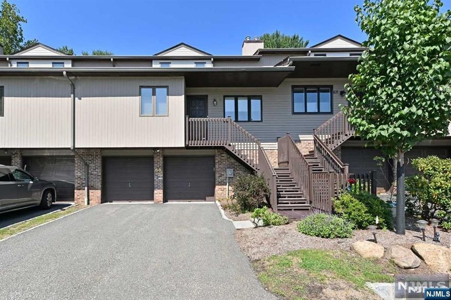 Sensational, pristine unit in Peach Hill. They don't come in better condition than this one! Gorgeous granite counter kitchen w/center island. Adjoining family room with Fireplace. Living room has a custom-designed Mahogany built-in wall unit for ultimate functionality and sliders to deck/private back yard. First floor Primary suite has a renovated full bath with shower stall and separate tub. Ample closet space. Two lg. bedrooms and full renovated bath on upper level. Very lg. custom designed fin. basement with mahogany bar, wood floor, built-in bench and powder rm. Great for casual entertaining. Oversized two-car garage. Ramsey features a first rate school system, wonderful restaurants, rec programs, farmer's market and convenient accessibility to NYC bus and train. Tenant req: 1 1/2 mo. security, 1st $200 of each repair, NTN application/credit check. No smoking in unit. No pets. Photos shown are from a previous tenancy.