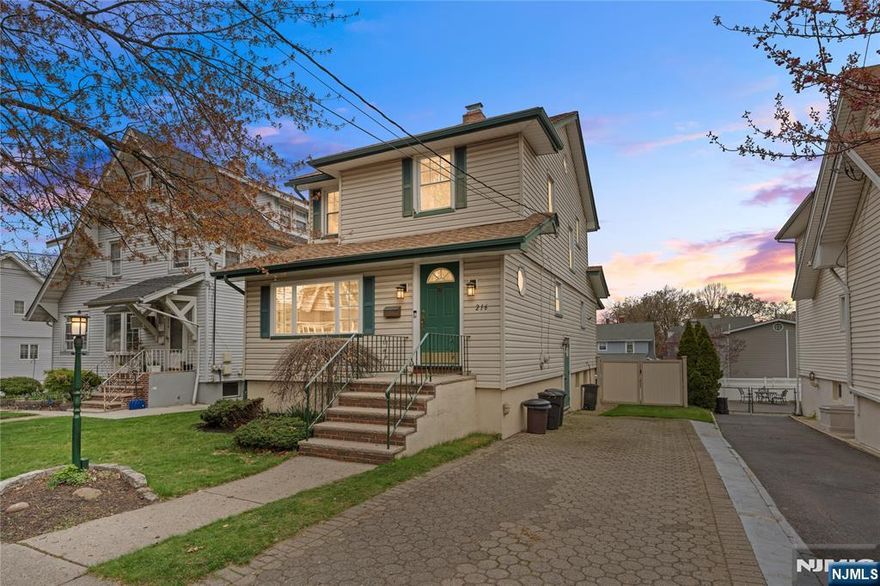 Welcome to 216 5th Street, a well maintained single-family home in the heart of Ridgefield Park. This 3-bedroom, 2-bath residence combines classic charm with practical living spaces, set on a deep lot with a large, beautifully maintained garden and backyard. The main level offers a comfortable living room w/ fireplace that flows into a separate dining area, ideal for everyday use and entertaining. A cozy sunroom and a beautiful enclosed porch to provide additional year-round living space and natural light. Upstairs, three well-proportioned bedrooms with ample closet space provide privacy and storage with an additional bonus room Den, that can be used as a home office. A walk-up attic adds valuable additional storage and potential for future customization. The basement level provides a side door entrance from the drive way and also a large canvas of opportunities to expand the current layout. Laundry + Bathroom also included in the lower level. Outside, the expansive backyard and garden create a private setting for outdoor dining, gardening, and recreation. The property has been extremely well maintained, reflecting consistent care and attention over the years. This home offers convenient access to local shops, parks, schools, and major commuting routes to surrounding business and cultural centers. This is a strong opportunity for buyers seeking a move-in ready home with extra space and a generous outdoor area in a well-established Bergen County community.